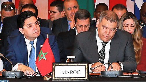 صفعة ملكية على خد وزير الخارجية وحبل الإقالة يتلف حول عنقه!.. محمد السادس يُبعد الوزير بوريطة عن قضية المغاربة العالقين بالخارج ويكلف وزير الداخلية بتدبير الملف والأخير يعلن رسمياً عن الشروع في نقل المغاربة العالقين في سبتة ومليلية المحتلتين 