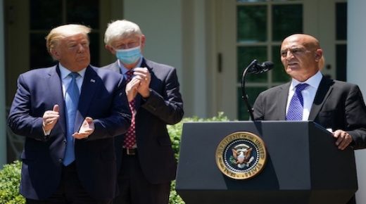 Chief Adviser "Warp Speed" vaccine effort Monecef Slaoui (R), with US President Donald Trump, speaks on vaccine development on May 15, 2020, in the Rose Garden of the White House in Washington, DC. (Photo by MANDEL NGAN / AFP)