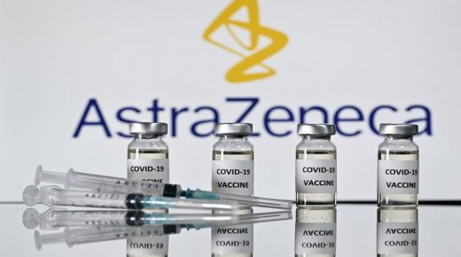 An illustration picture shows vials with Covid-19 Vaccine stickers attached and syringes with the logo of British pharmaceutical company AstraZeneca on November 17, 2020. (Photo by JUSTIN TALLIS / AFP)