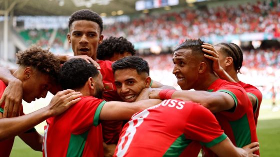 Paris 2024 Olympics - Football - Men's Group B - Argentina vs Morocco - Geoffroy-Guichard Stadium, Saint-Etienne, France - July 24, 2024. Morocco players celebrate after Soufiane Rahimi of Morocco scores their first goal REUTERS/Thaier Al-Sudani